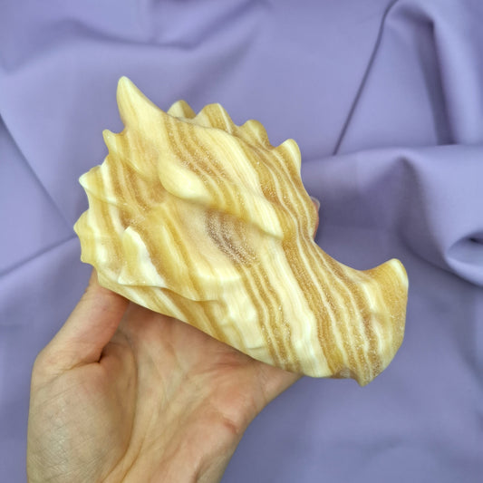 Raidallinen oranssi kalsiittilohikäärme